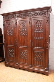 3 door gothic style armoire in oak