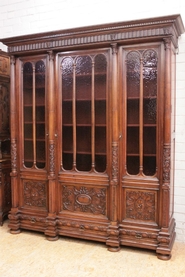 3 door renaissance style bookcase in walnut signed LEROLLE PARIS