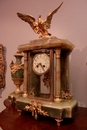 style Clock set in onyx and gilt bronze, France 19th century