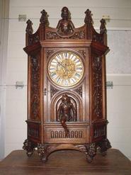 French walnut gothic wall clock with statues and signed by LEROLLE PARIS 19th century
