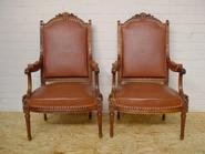 pair of walnut louis XVI arm chairs with leather 19th century 28 w x 47 t x 22 d (inch)