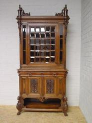 walnut figural cabinet signed by the maker 19th century