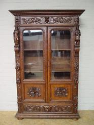 oak figural bookcase 19th century