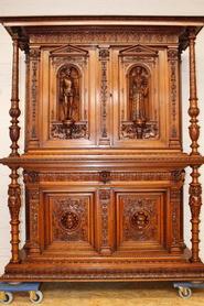 Walnut figural cabinet 19th century