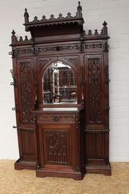 Oak gothic hall tree with cabinet