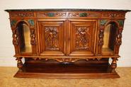 Walnut figural renaissance cabinet with marble inlay signed by the maken