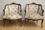 pair of walnut Louis XV arm chairs circa 1900