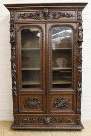 Oak figural hunt bookcase 19th century