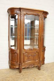 Walnut 3 door Louis XV bombay display cabinet with beveled glass circa 1900