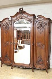 Monumental 3 door solid walnut Louis XV bombay armoire 19th century