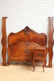 Walnut Louis XV bed and nightstand signed by DUFIN 19th century
