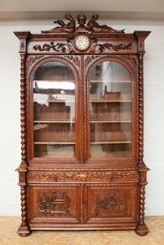 Oak hunt secretary desk/bookcase with clock 19th century
