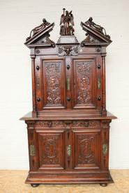 Walnut renaissance figural cabinet with marble inlay 19th century