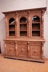 6 door Renaissance style figural Bookcase in bleached oak