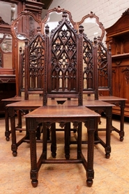 6 oak gothic style chairs