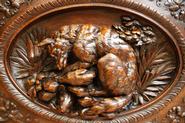 Oak, hunt bombay cabinet with cherubs 19th century