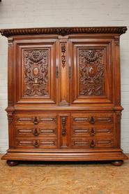 Quality solid walnut Henri II cabinet with 6 drawers and angel faces 19th century