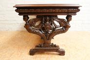 Walnut figural renaissance desk table 19th century