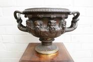 Bronze Renaissance vase with faces 19th century
