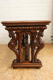 Walnut renaissance center table with removable top 19th century