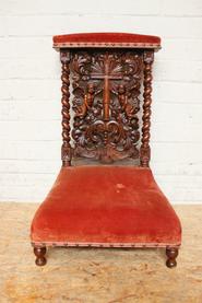 Walnut prayer chair with angels 19th century