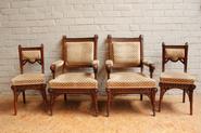 Two walnut gothic arm chairs and two chairs 19th century