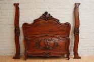 Nice walnut Louis XV bed with birds signed by Henri Bonjour 19th century