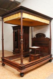 Walnut renaissance bedroom with canopy bed 19th century