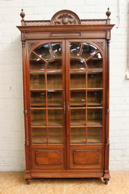 Walnut bookcase with beveled glass 19th century