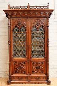 Walnut gothic bookcase with stained glass, 19th century