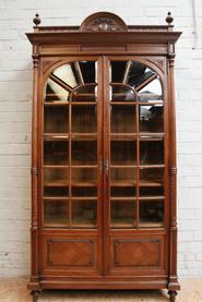 Walnut bookcase with beveled glass 19th century.