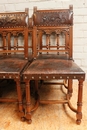 8 walnut Henri II chairs print leather, France 19th century