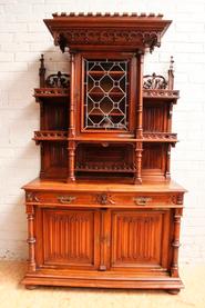 Walnut gothic cabinet with stain glass door 19th century