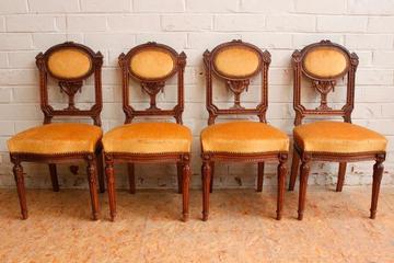 Set of 4 walnut louis XVI arm chairs 19th century.