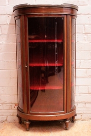 Bombe display cabinet in mahogany.