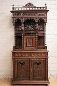 Breton figural cabinet