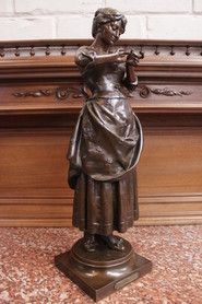bronze statue of a young lady who put a wedding ring signed L HALIGON