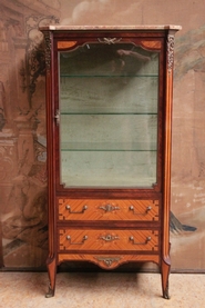 Display cabinet with inlay bronze ornaments and marble top