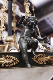 Empire chandelier in bronze with 4 cherubs