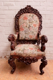 Exceptional carved renaissance style arm chair with tapistry