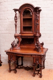 Exceptional figural desk with display top in walnut