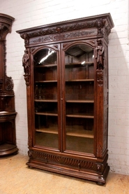 Exceptional figural renaissance bookcase in oak
