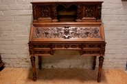 Exceptional figural renaissance desk in walnut dated 1892