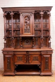 Exceptional monumental walnut renaissance figural cabinet in walnut