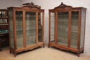 Exceptional pair 3 door walnut display cabinets