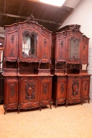 Exceptional pair Louis XV style cabinets with puttis