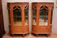 Exceptional pair of oak bombe Louis XVI display cabinet with marble top