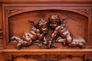 Exceptional renaissance cherub armoire and bed in walnut
