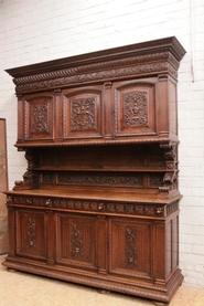 Exceptional renaissance style cabinet with 6 doors in walnut