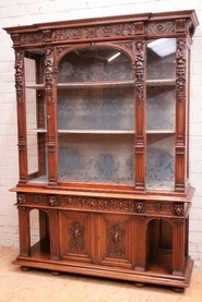 Exceptional Renaissance style display cabinet in walnut